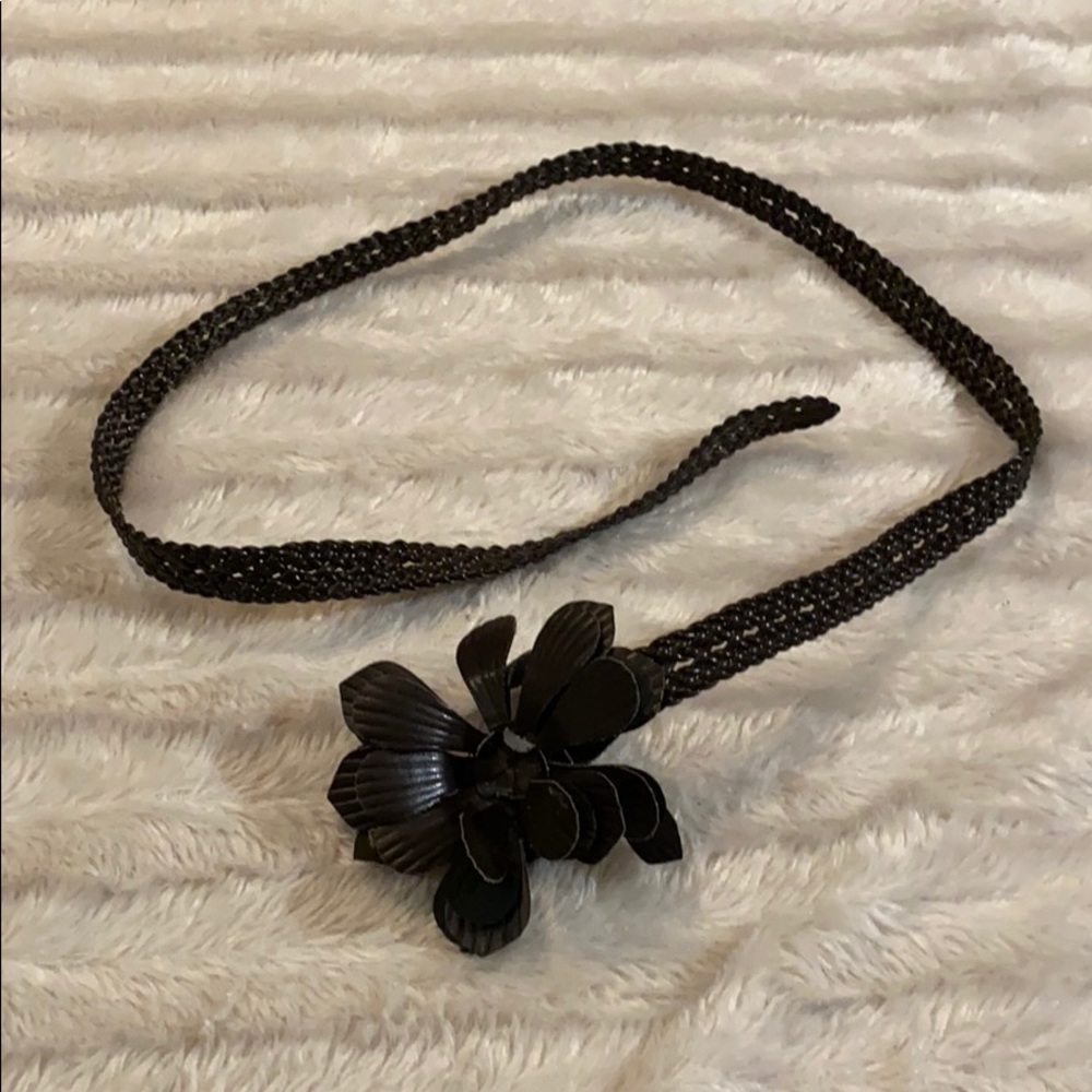 Leather flower belt very adjustable braided belt